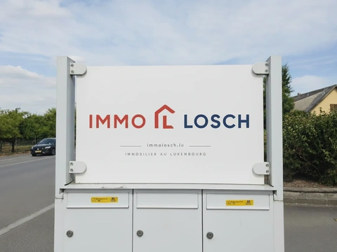 ImmoLosch identity — ImmoLosch exterior signage