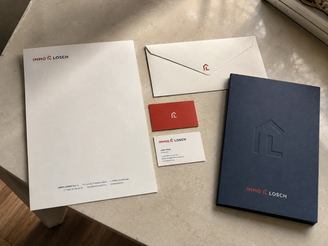 ImmoLosch identity — ImmoLosch stationery system